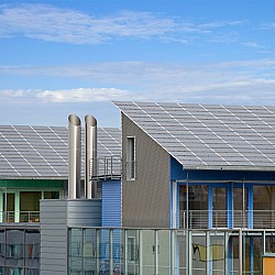 Photo of reflective roofing on energy-efficient housing by peart/istockphoto.com.