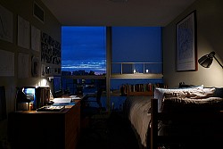 Framed art, hip linens and good lighting make this dorm room attractive. (Photo: Jeff.Dlouhy/Flickr creative commons)