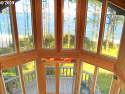 Do you want to buy this house on the Oregon Coast? I do, too. But in order to do it, you'll need a real estate agent. (Photo: Gold Beach Real Estate/Flickr)