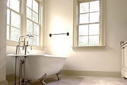The only tile is on the floor. Walls are painted white. (photo: wollwerth/istockphoto.com)