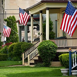 Flags fly appropriately on staffs. Photo by summersetretrievers/istockphoto.com