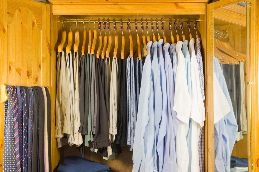 Clothing grouped by type and color. Photo of an orderly closet by vandervelden/istockphoto.com.