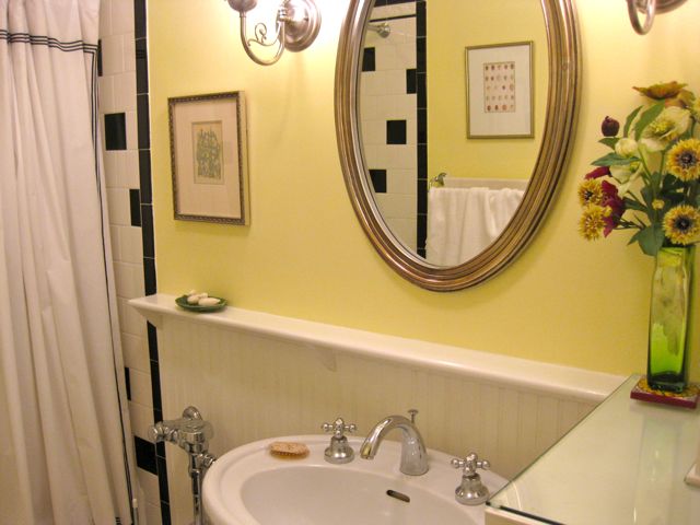This photo shows my bathroom, with the Wood element represented in the beautiful silk flower arrangement on the right.