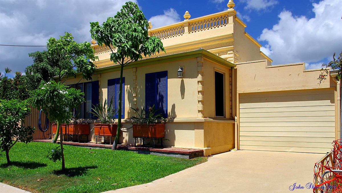 Painted concrete house by john skewes/flickr