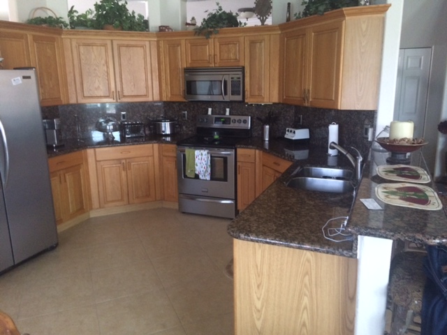 Before: Solid oak cabinets that needed an update