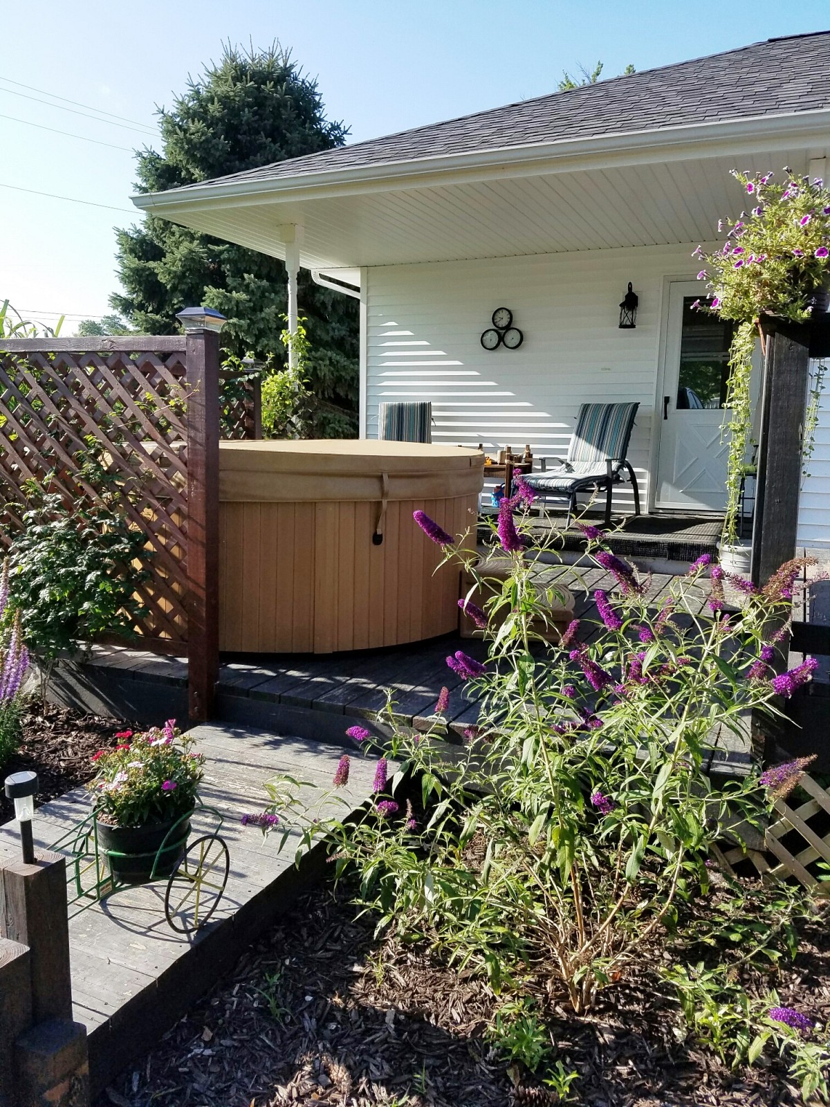 Hot tub in our beautiful backyard